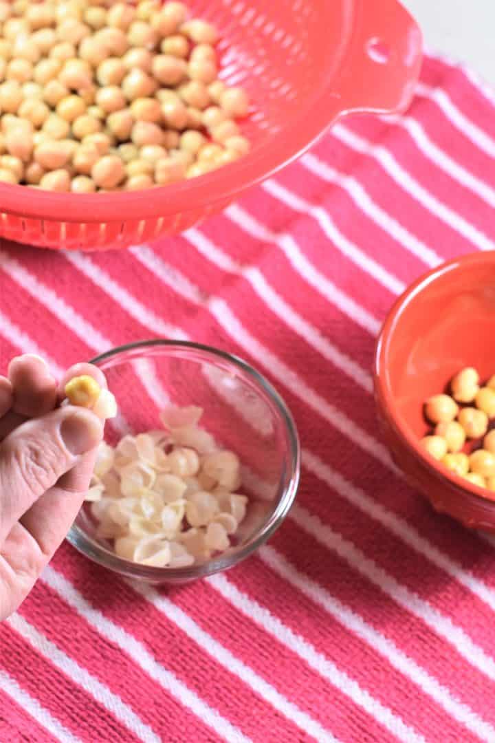 Removing the skin from a chickpea