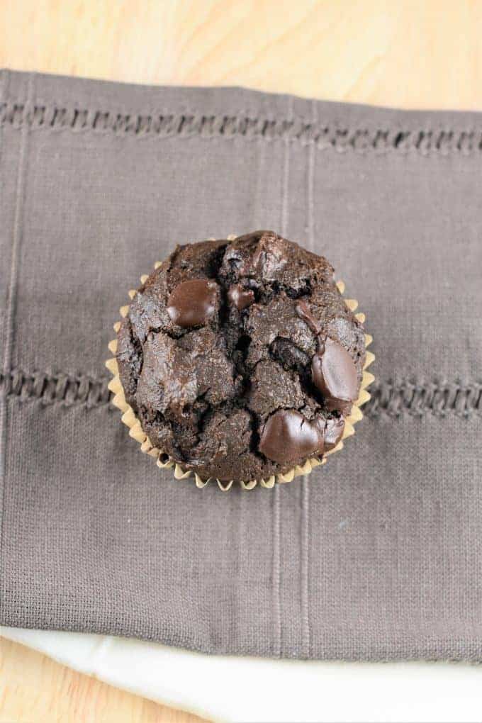 overhead of a muffin on a kitchen towel
