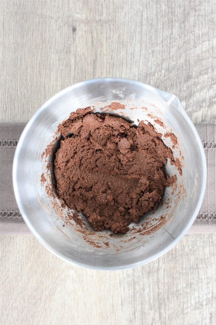 wet and dry combined ingredients in a mixing bowl