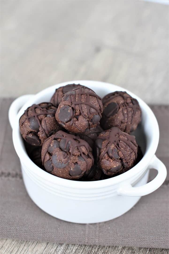 cookie bites in small serving dish on a kitchen towel