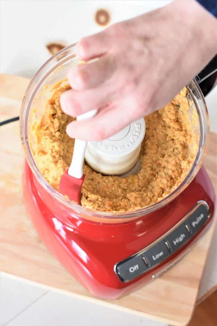 Scraping sides of food processor with a spatula