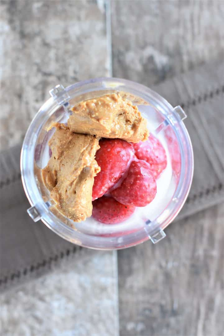 Peanut butter and strawberries in a cup