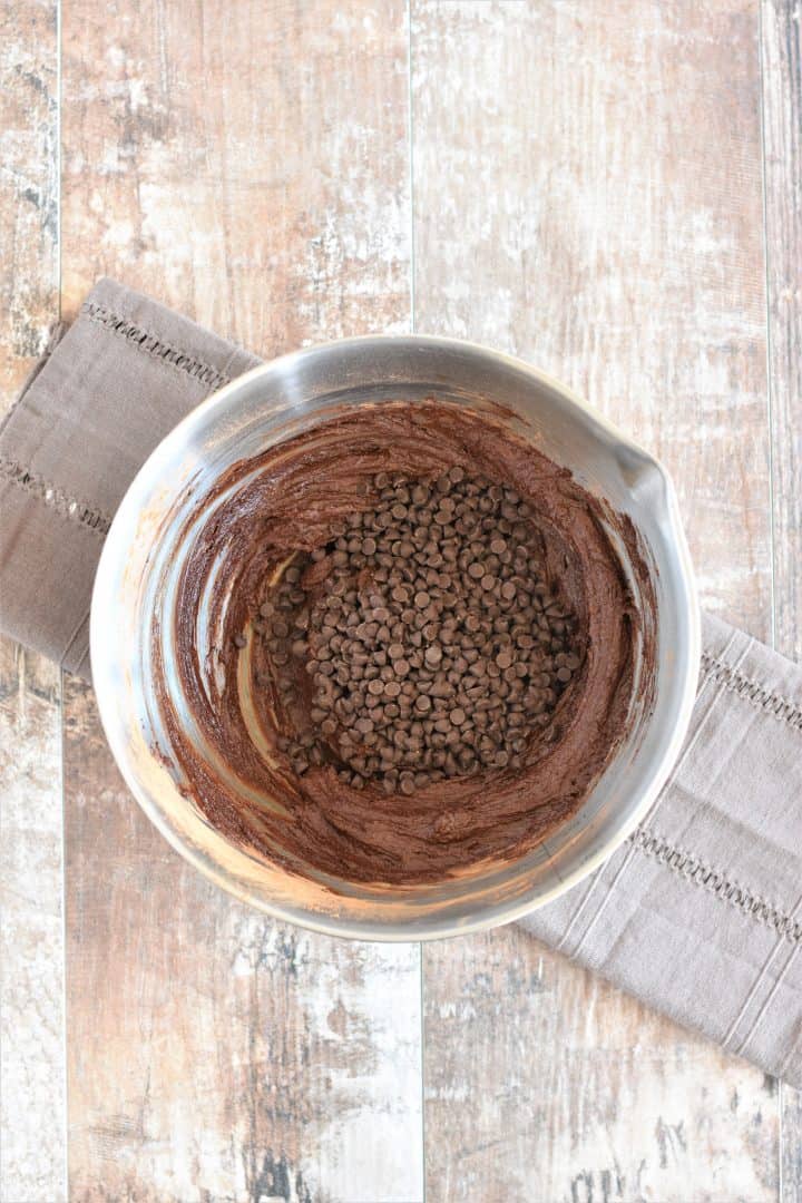 Chocolate chips added to the batter in the mixing bowl