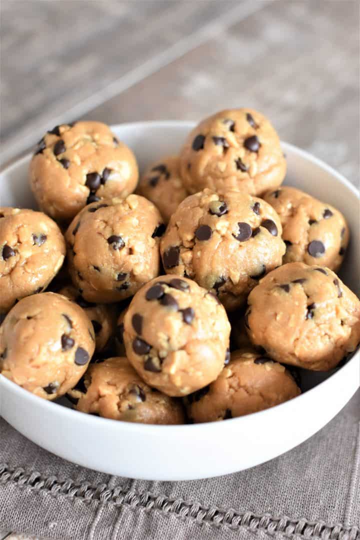 Peanut butter energy balls in a white bowl