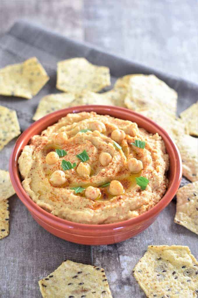 Hummus without tahini in a red bowl