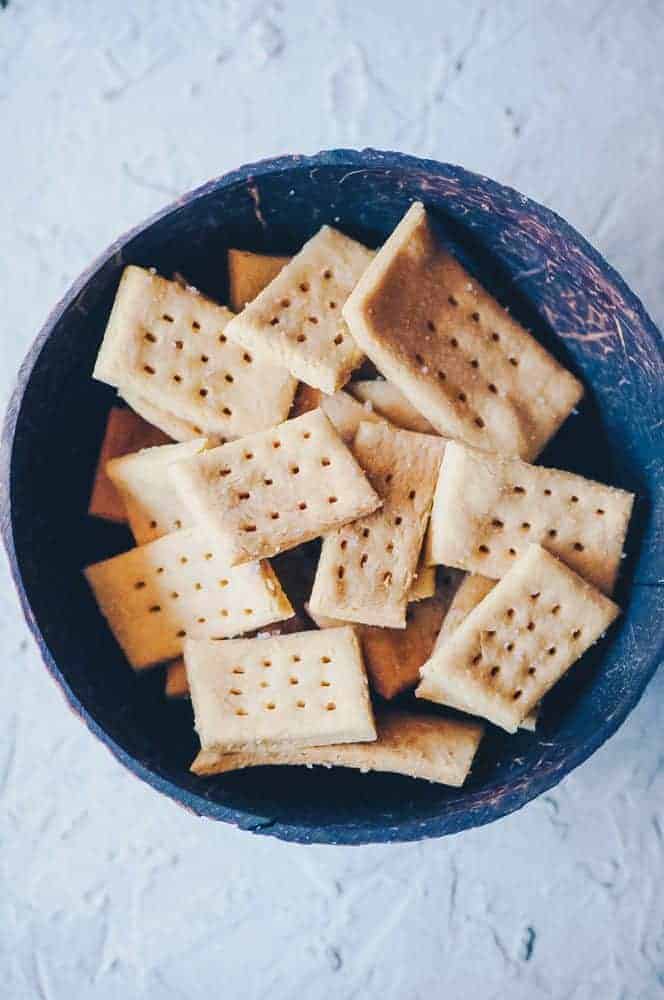 Chickpea crackers in a blue bowl