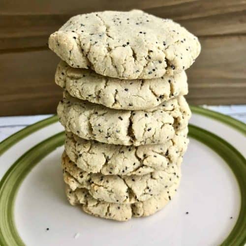 front view of lemon poppyseed cookies stacked up on a plate