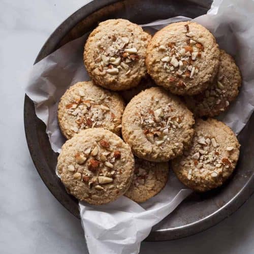 overhead of maple cookies in bowl with wax paper