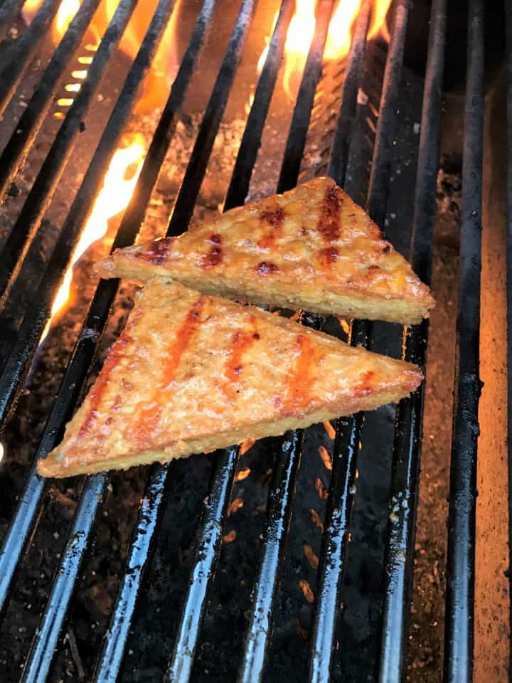 tempeh cooking on the grill