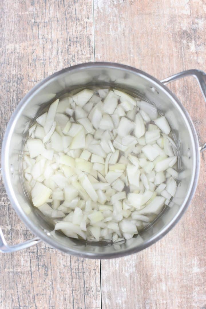 Onion and wine in soup pot