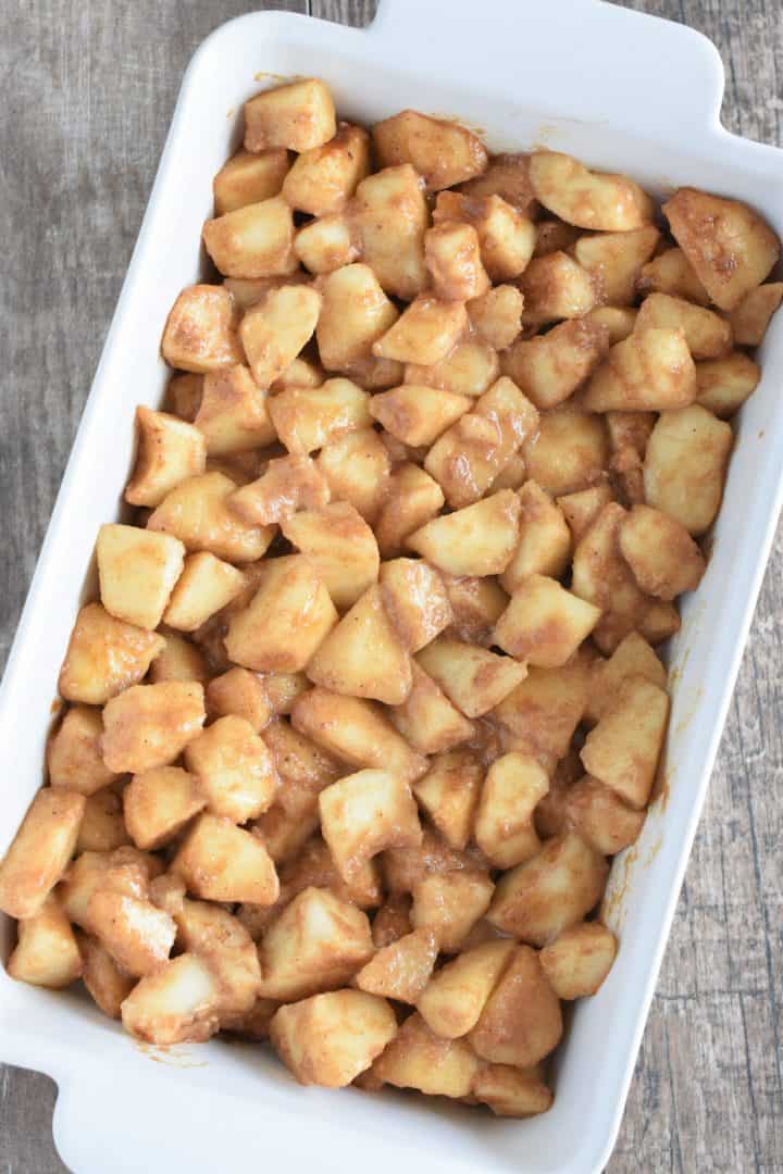 coated pear chunks in a baking dish