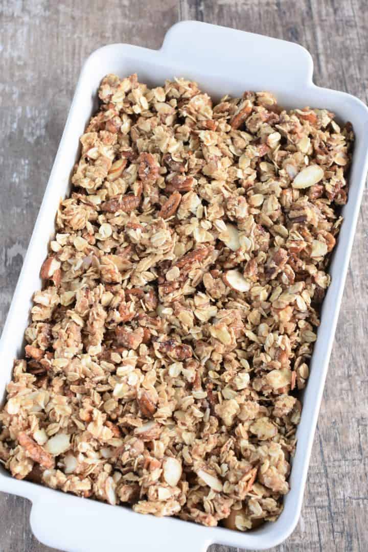 Topping sprinkled over top of the pear chunks in baking dish