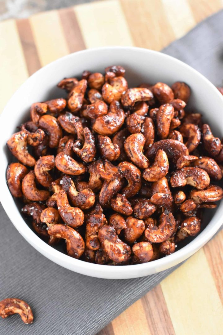 Sweet and Spicy Roasted Cashews in a white bowl