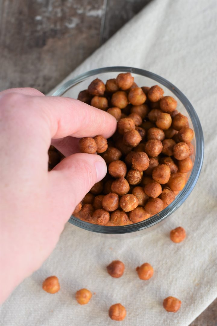 Grabbing some of the Buffalo chickpeas from the bowl