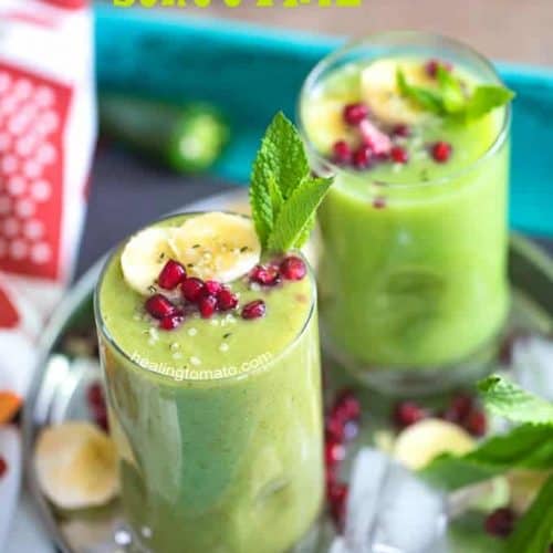 two jalapeno pineapple smoothies on a serving tray.