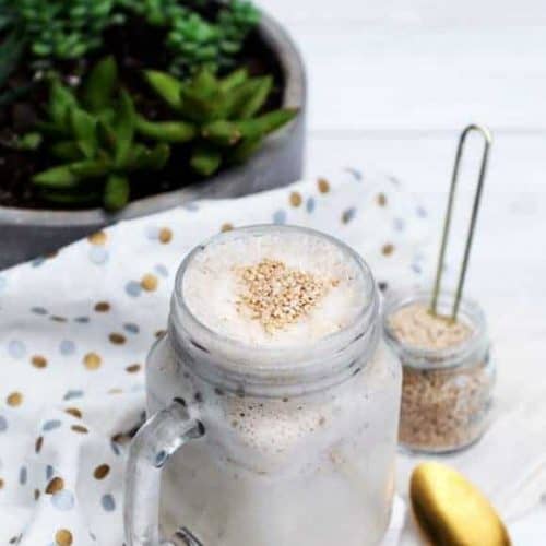 tahini date shake in a mason jar.