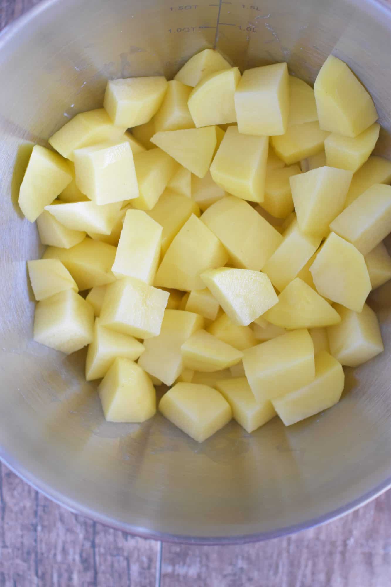 potato chunks added to mixing bowl