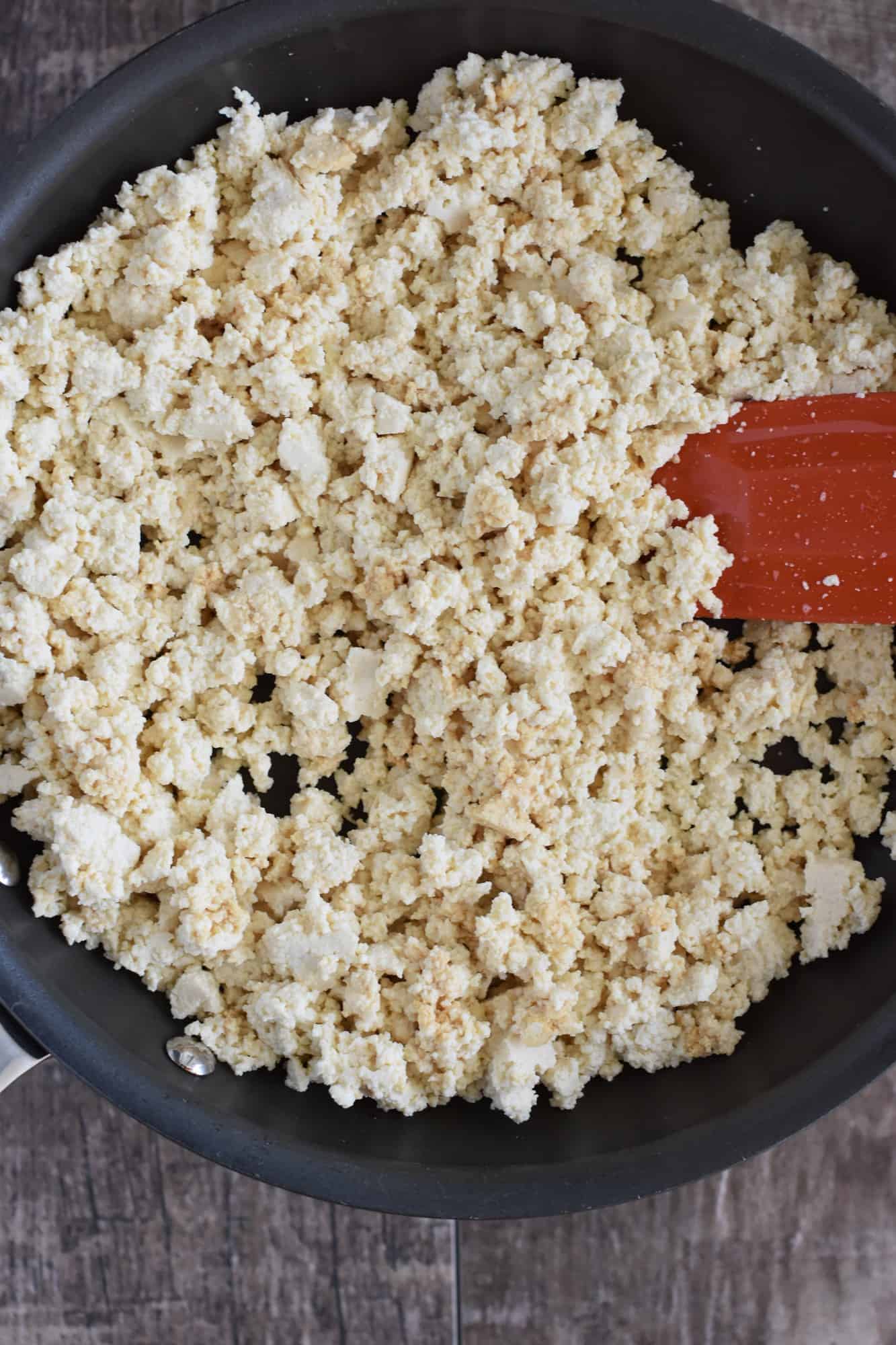 stirring the tamari into the crumbled tofu