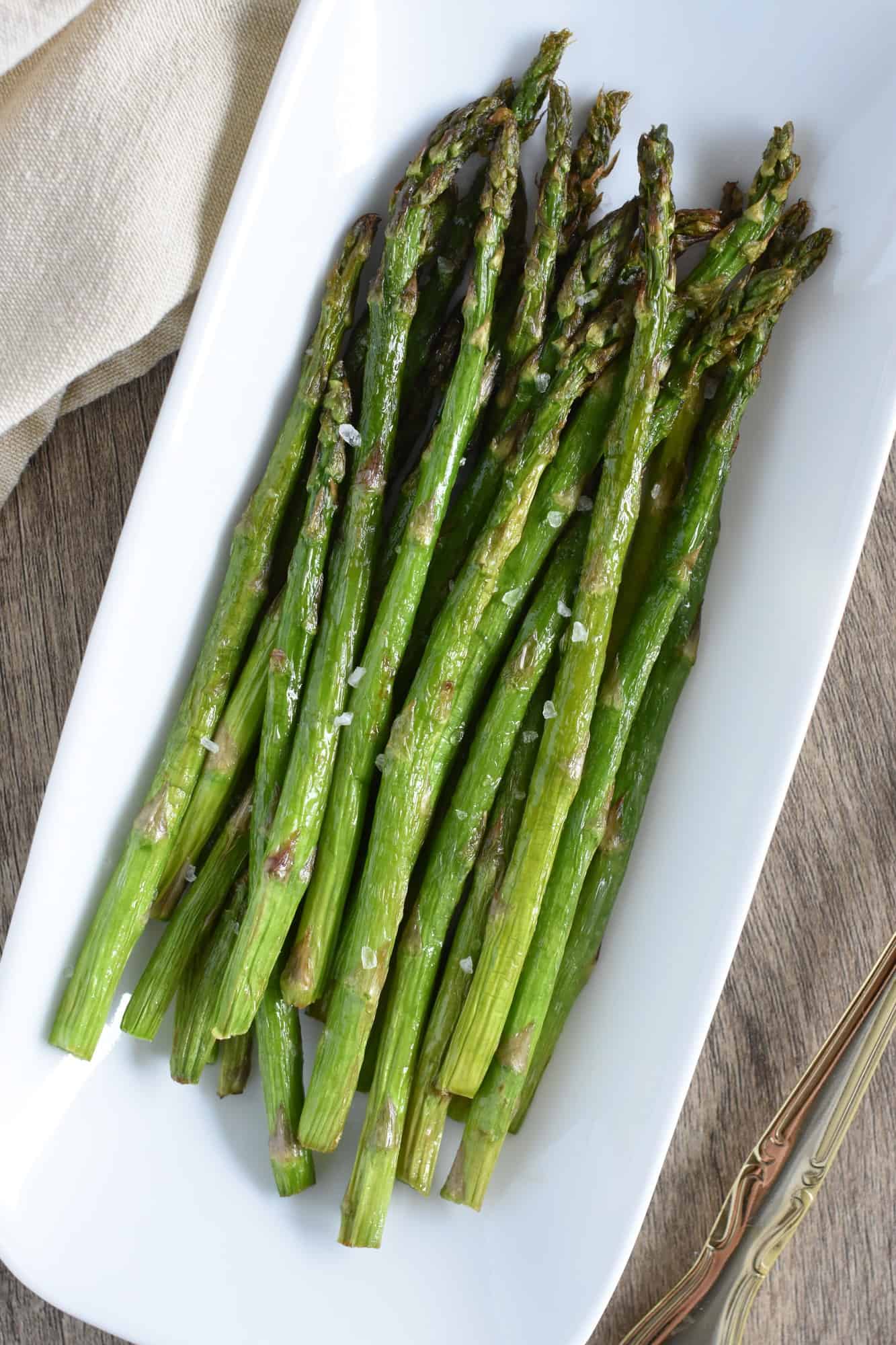 asparagus on white serving plate