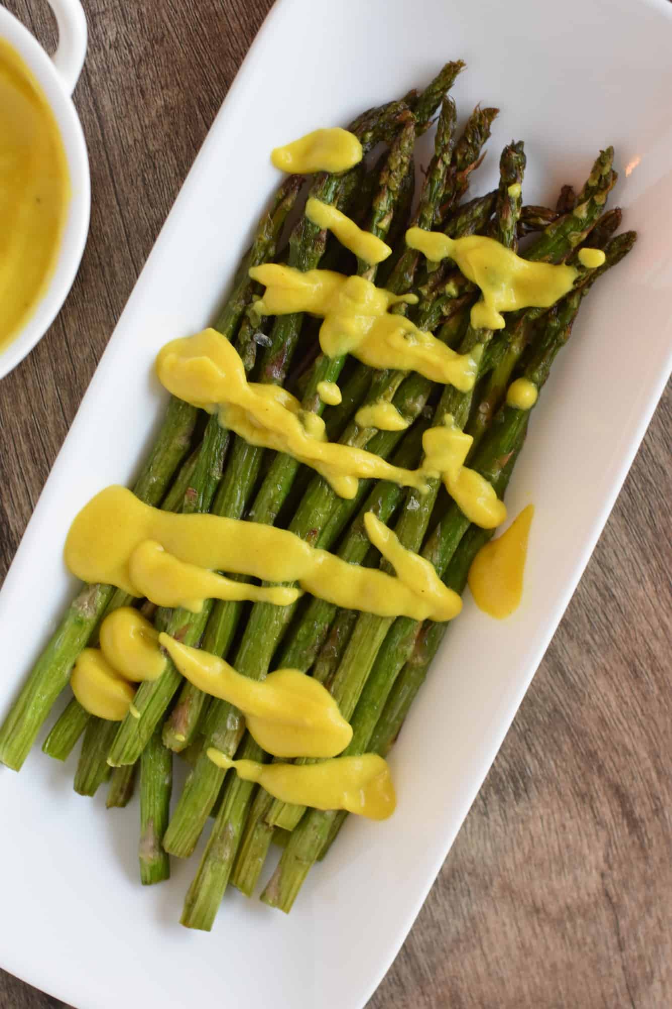 asparagus topped with vegan hollandaise