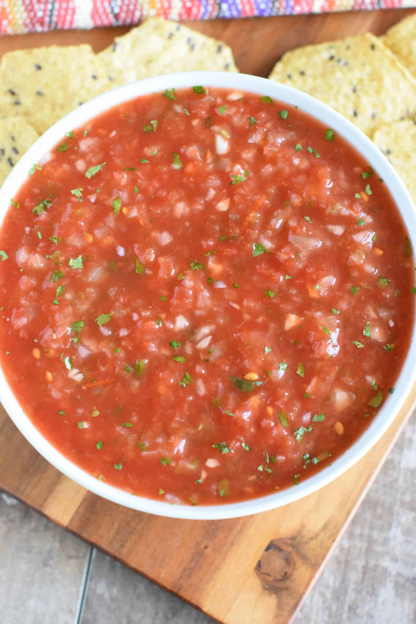 overhead closeup of salsa in a white bowl