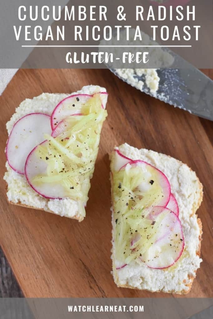 pin showing ricotta toast cut in half on wooden board.