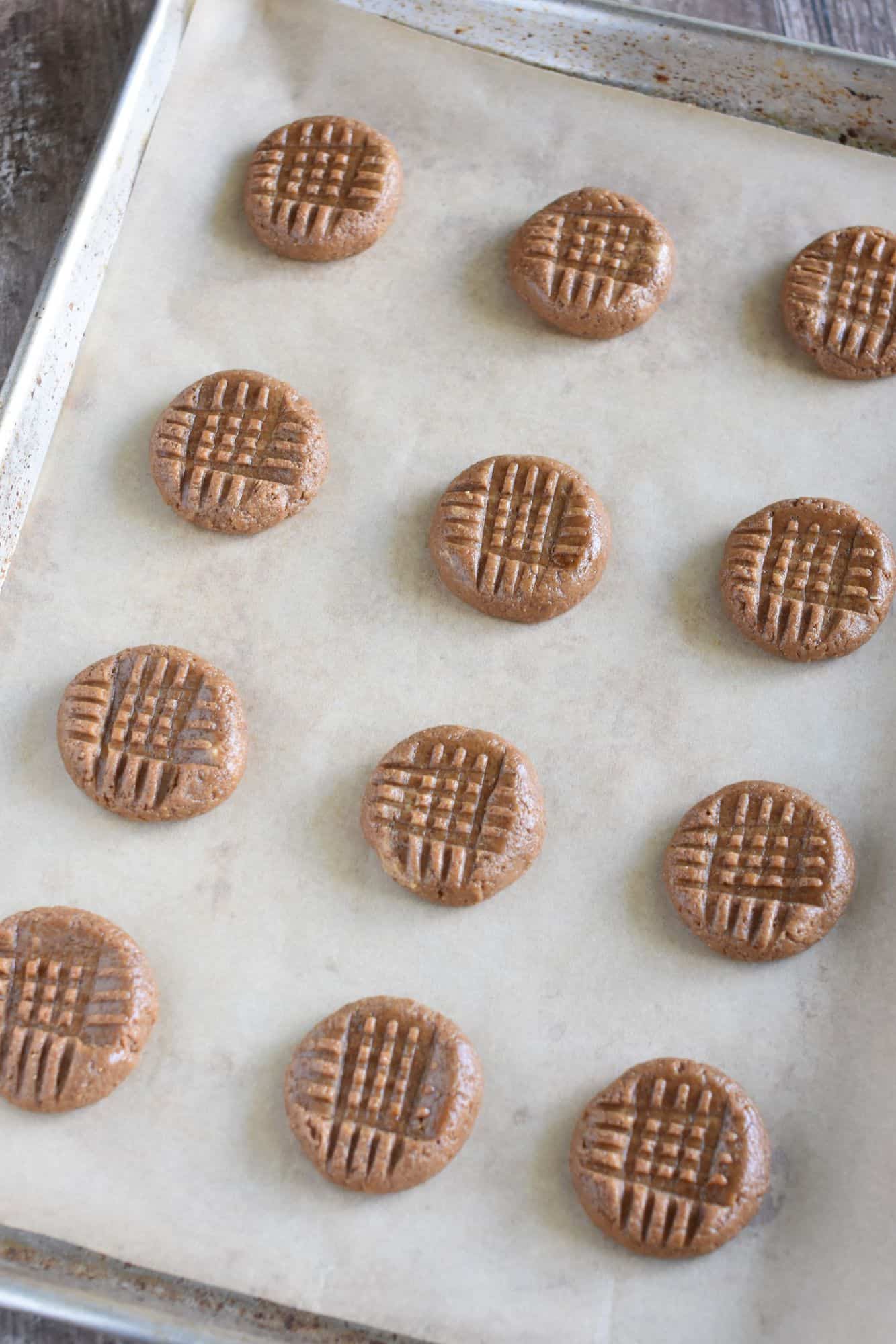 unbaked cookies on baking sheet