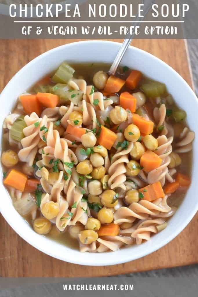 pin showing overhead of soup in a white bowl with a spoon in it