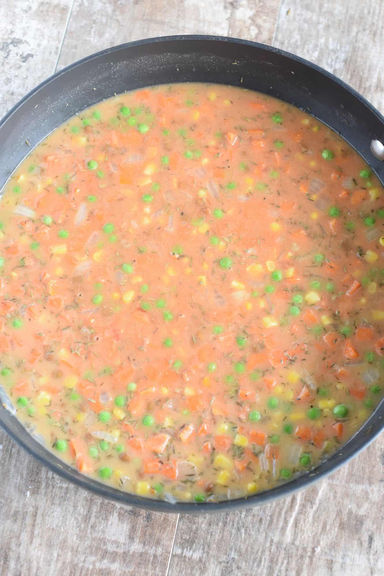 lentils, broth, tomato paste, Worcestershire, slurry and seasonings added