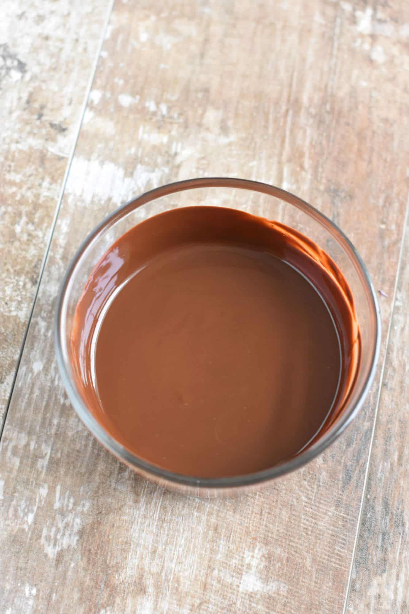 melted chocolate in small glass bowl