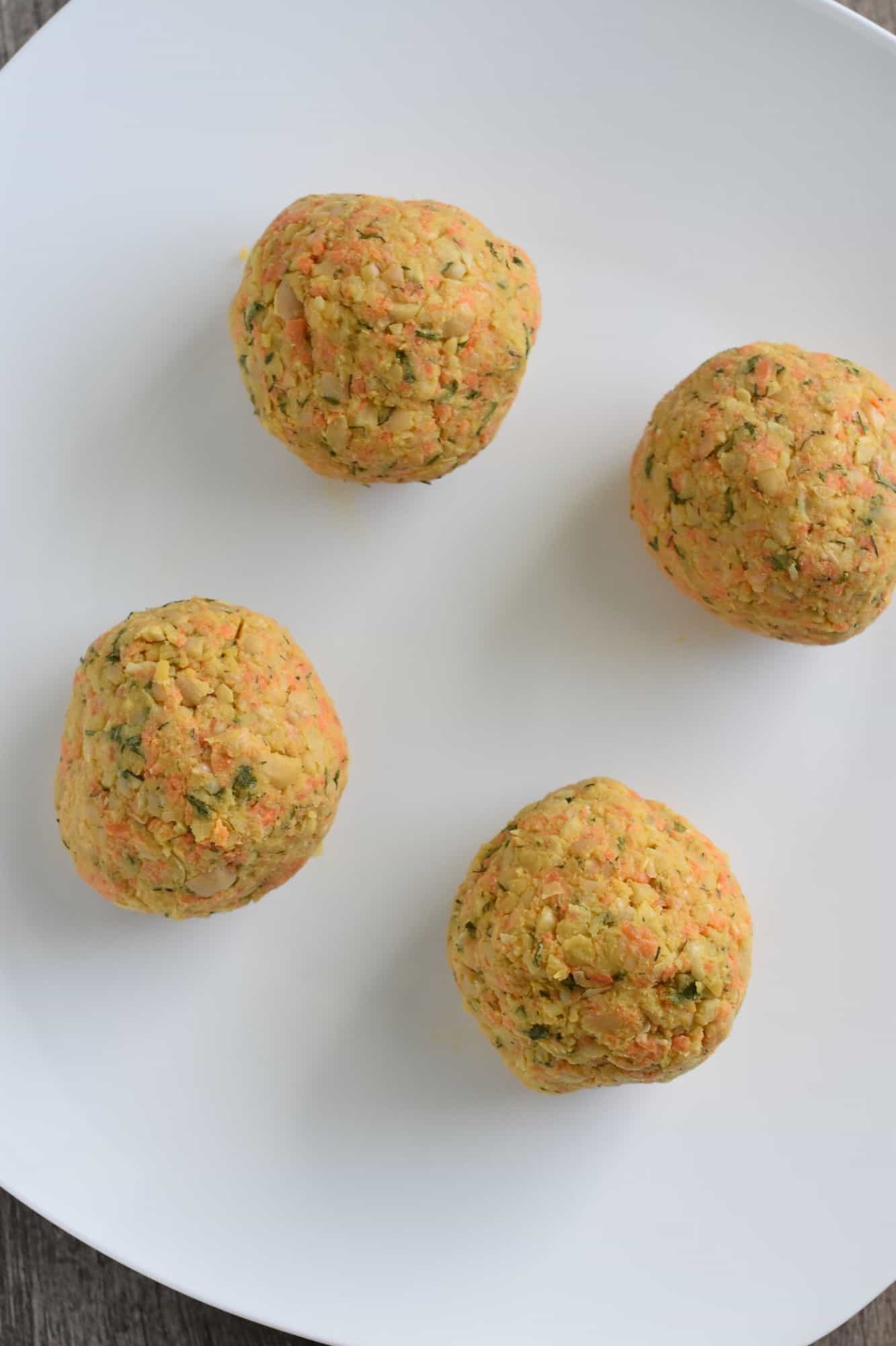 chickpea mixture formed into 4 balls of equal size