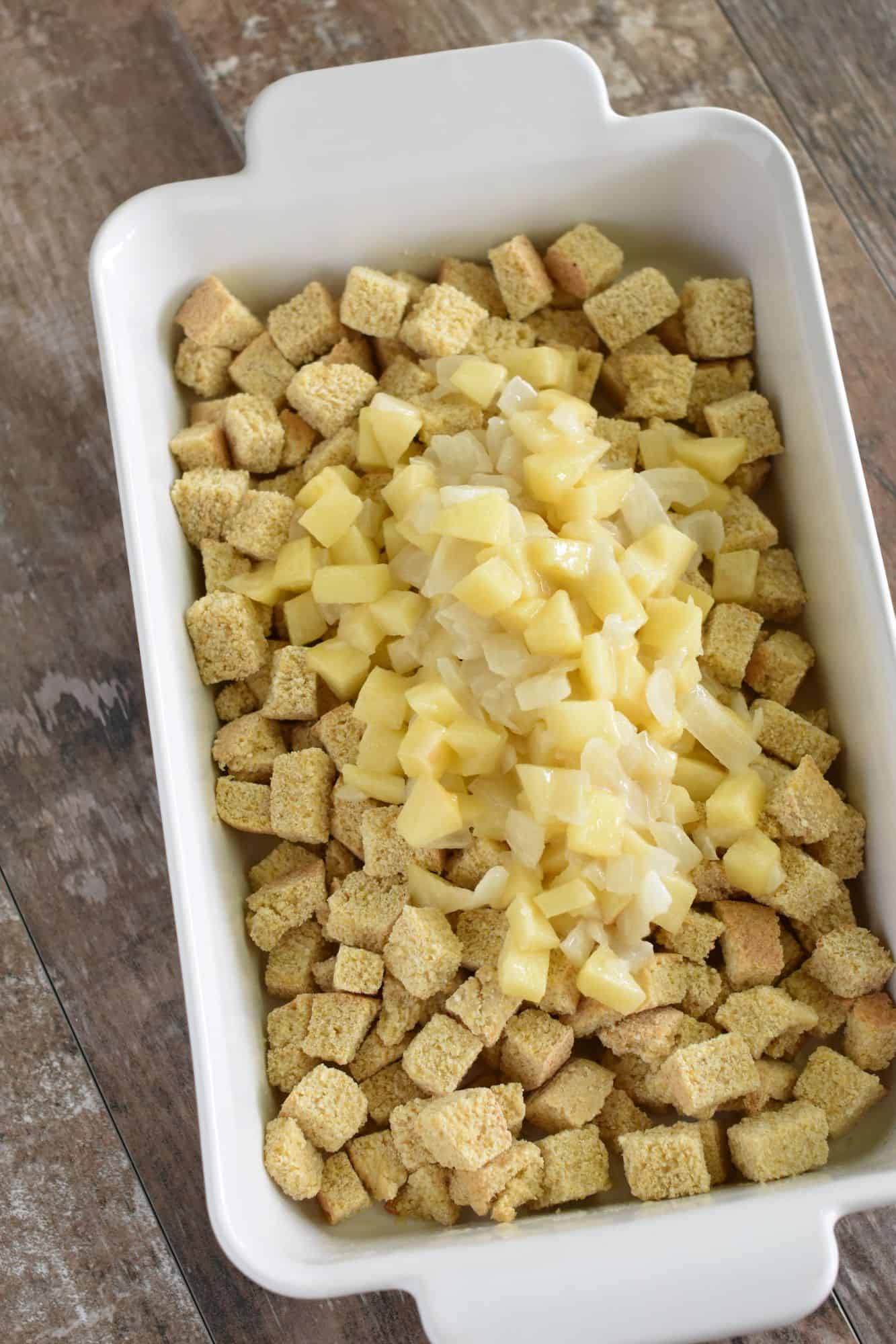 onion and apple mixture added to casserole dish