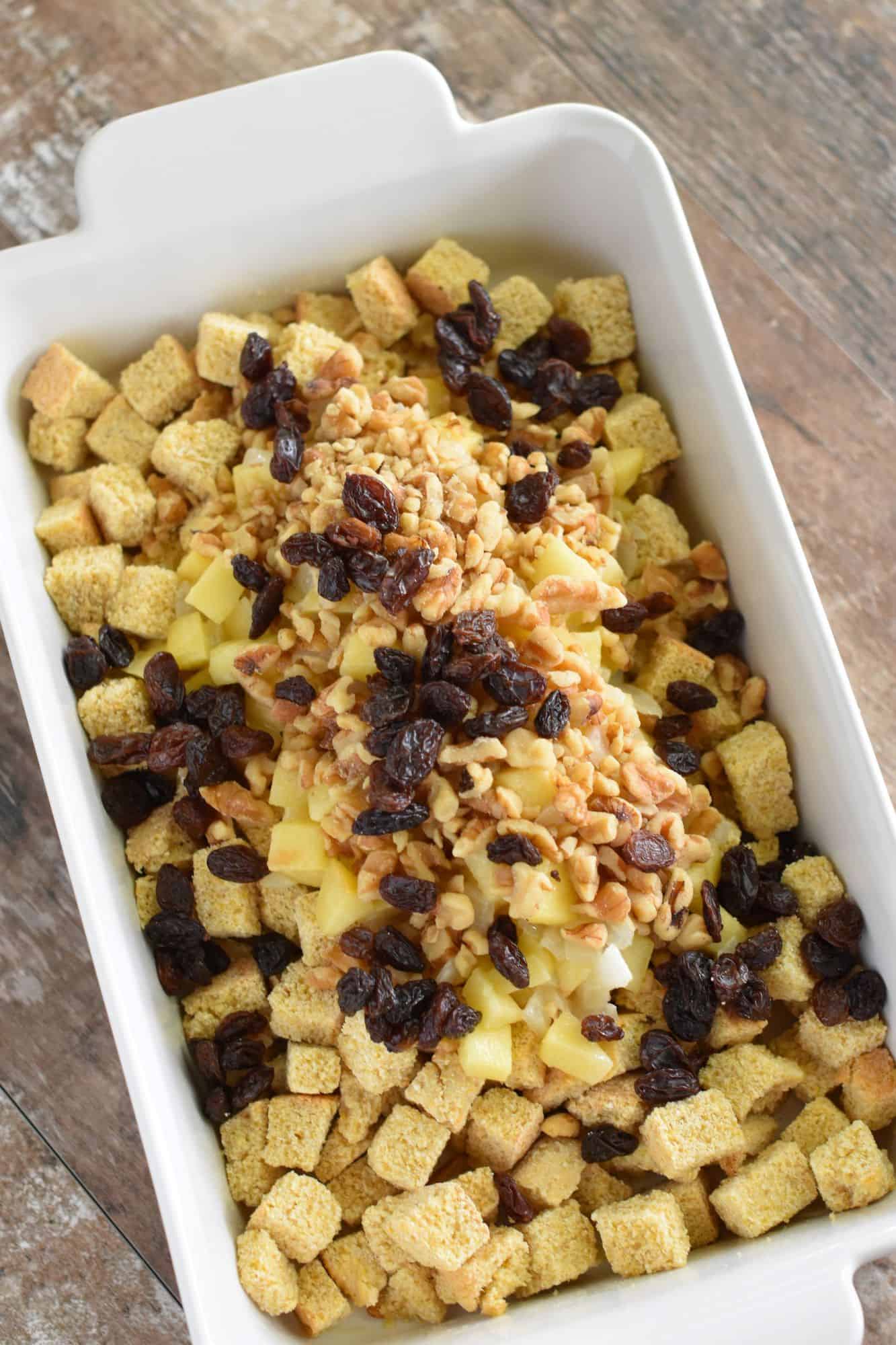 walnuts and raisins added to casserole dish