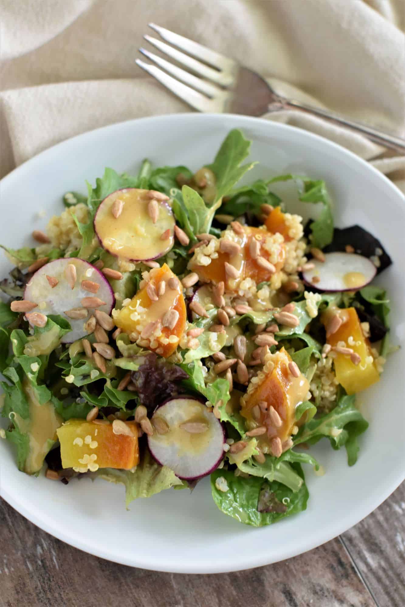 salad topped with sunflower seeds