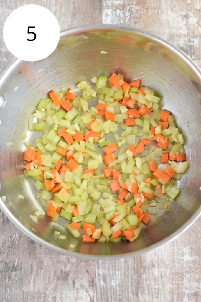 onion, garlic, carrot and celery cooking in pot