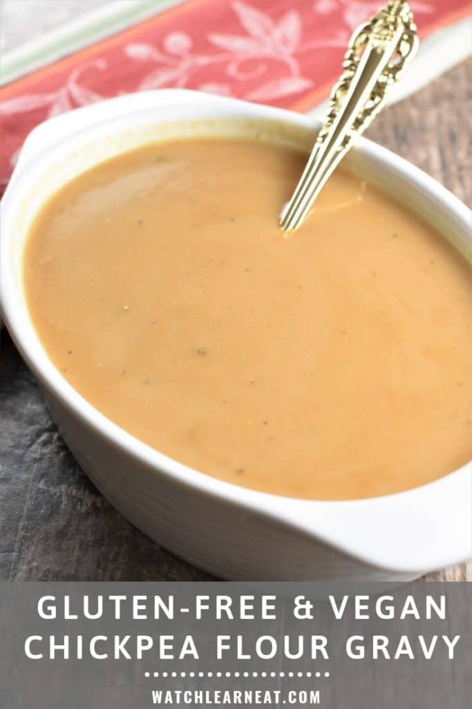 pin showing gravy in white serving dish with ladle in it