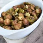 close-up of Brussels sprouts in white baking dish