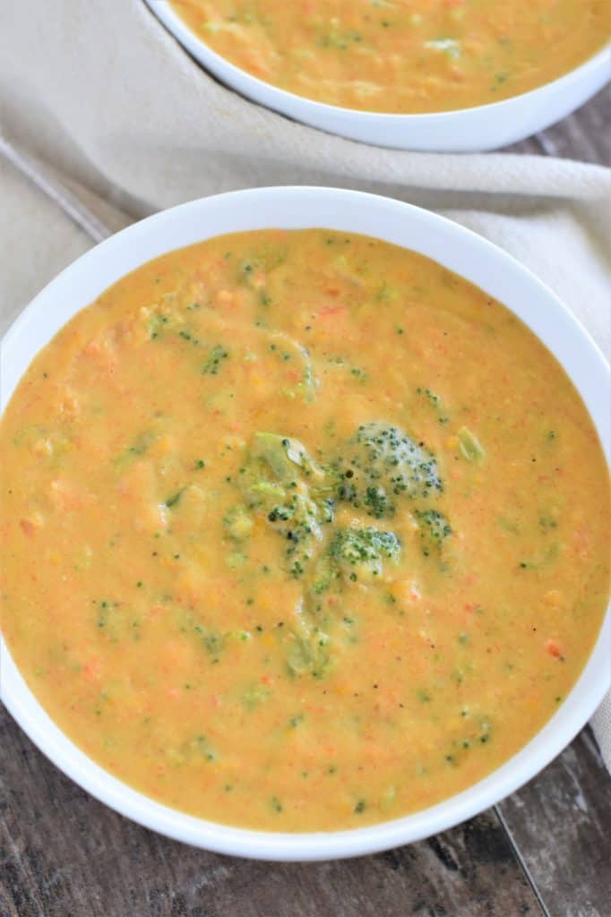 overhead of soup in white bowl with another one partially showing behind it