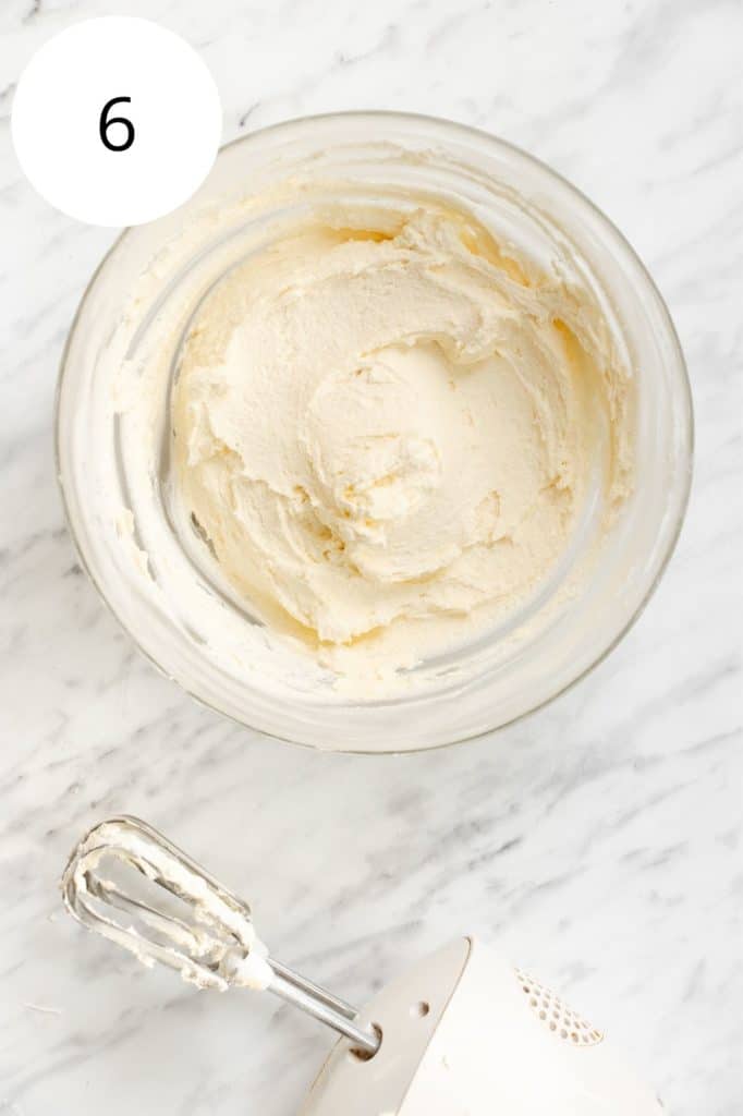 frosting in mixing bowl after mixing in powdered sugar