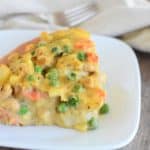 close-up slice of pot pie on a white plate