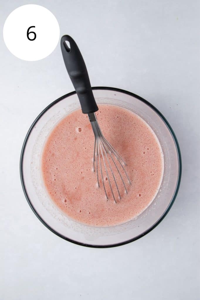 wet ingredients whisked together in mixing bowl with whisk