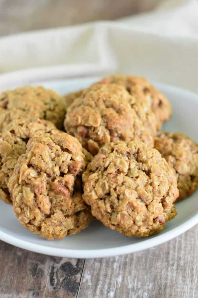 oatmeal coconut pecan cookies on a white plate