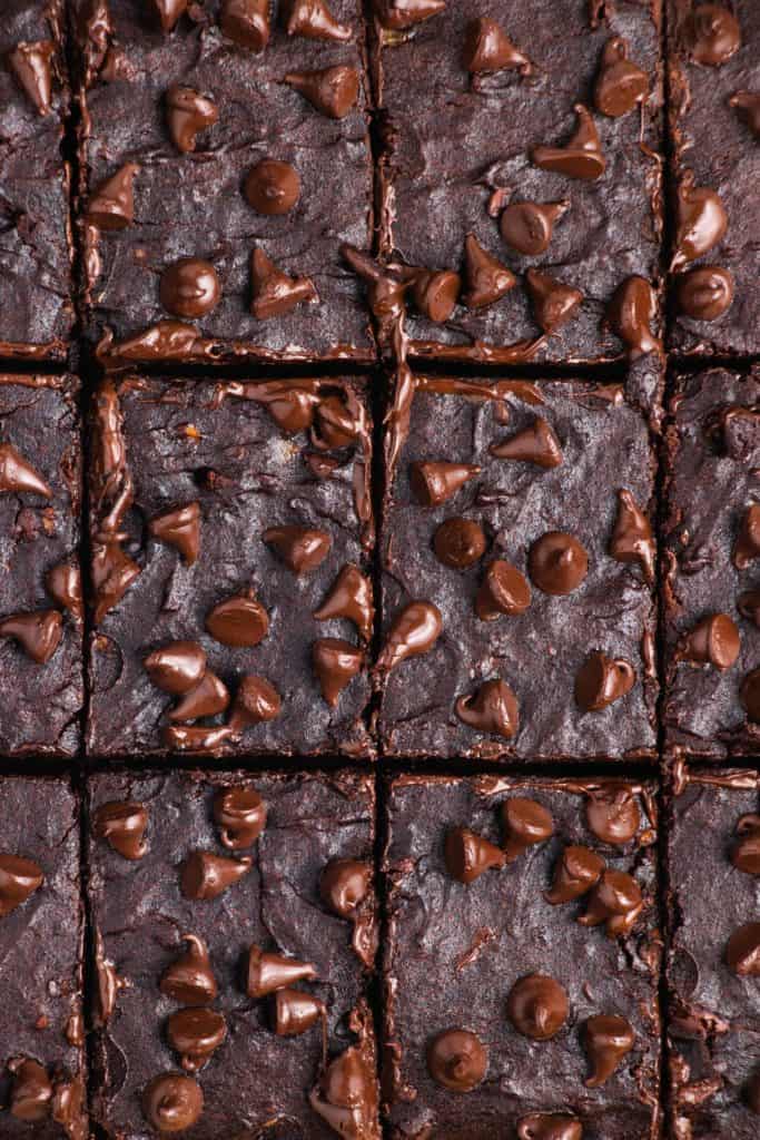 overhead of brownies right after being sliced before separating