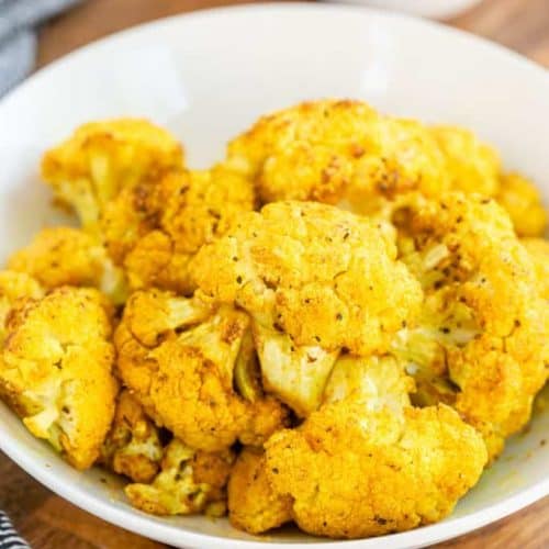 turmeric roasted cauliflower in white bowl