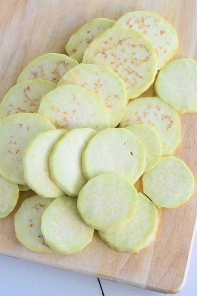 sliced eggplant on a wooden cutting board