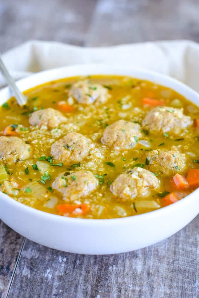 front view of soup in a white bowl