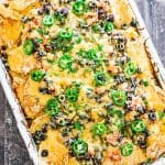 close-up of nachos on a sheet pan after baking