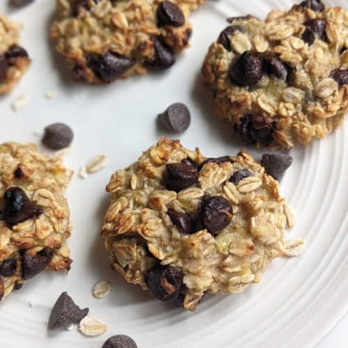 close-up overhead of banana oatmeal cookies on a white plate.