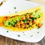 close-up of taco on a white plate.