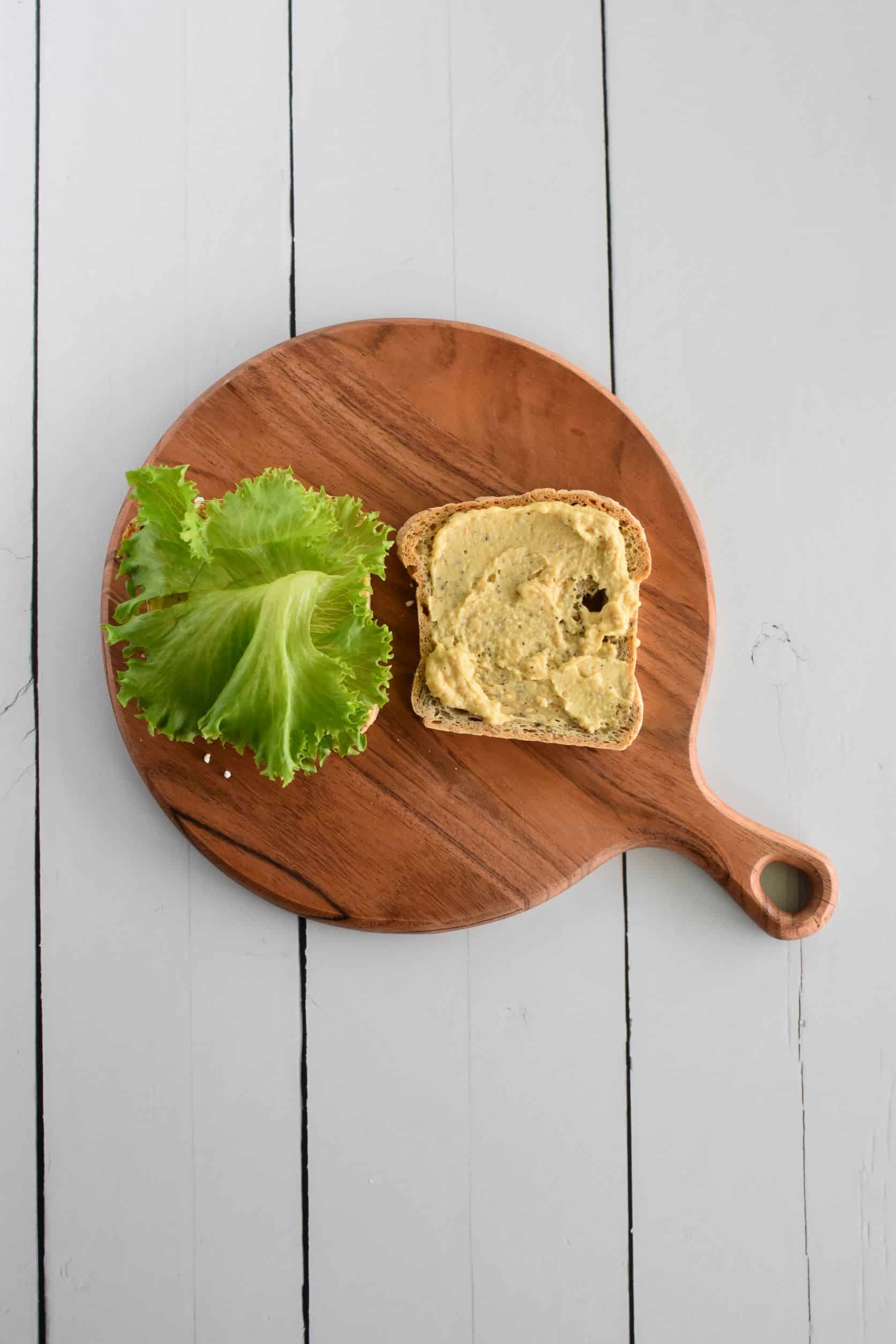 lettuce added to one side of toast.